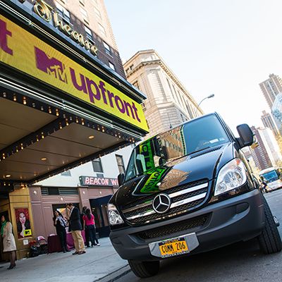 A luxury van parked outside of the MTV Upfront presentation.