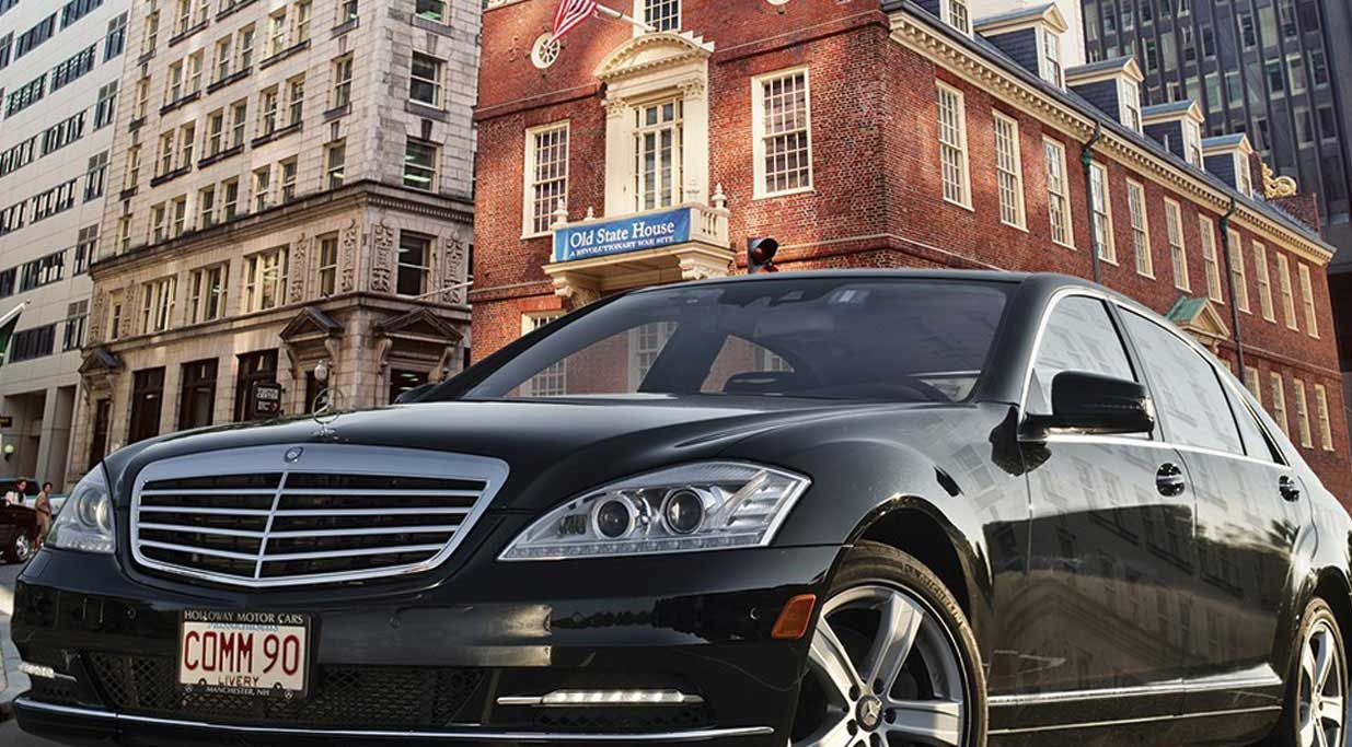 A luxury sedan from Commonwealth Worldwide’s fleet, parked outside the Old State House in their home city of Boston.