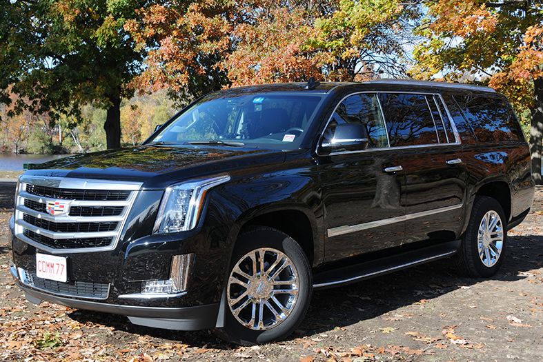A Cadillac ESV luxury SUV, used by Commonwealth Worldwide for chauffeured black car services.