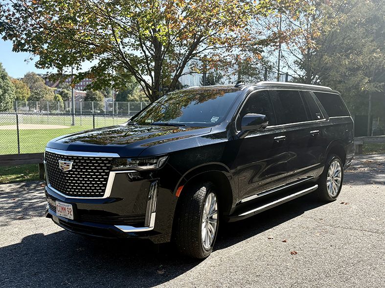 A Cadillac ESV luxury SUV, used by Commonwealth Worldwide for chauffeured black car services.