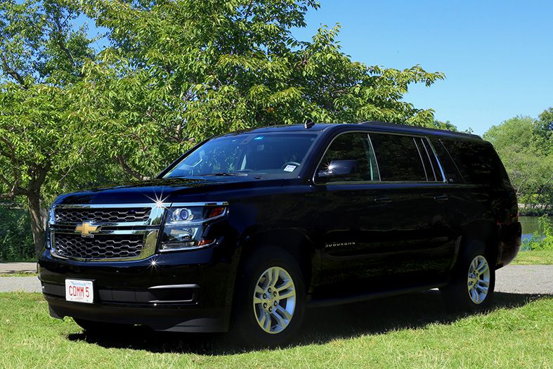 A Chevrolet Suburban luxury SUV, used by Commonwealth Worldwide for chauffeured black car services.